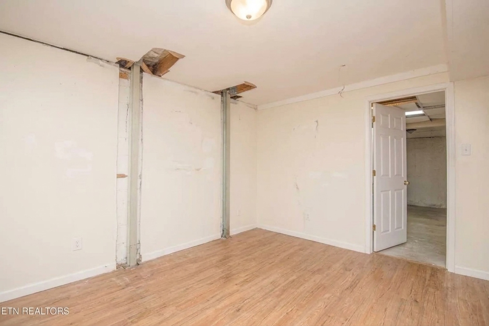 The same storage room, unstaged — unrepaired, as-is